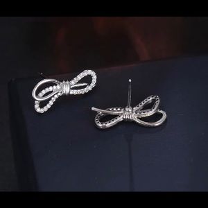 - Swarovski elements bow earrings rhodium plated - not swan stamped